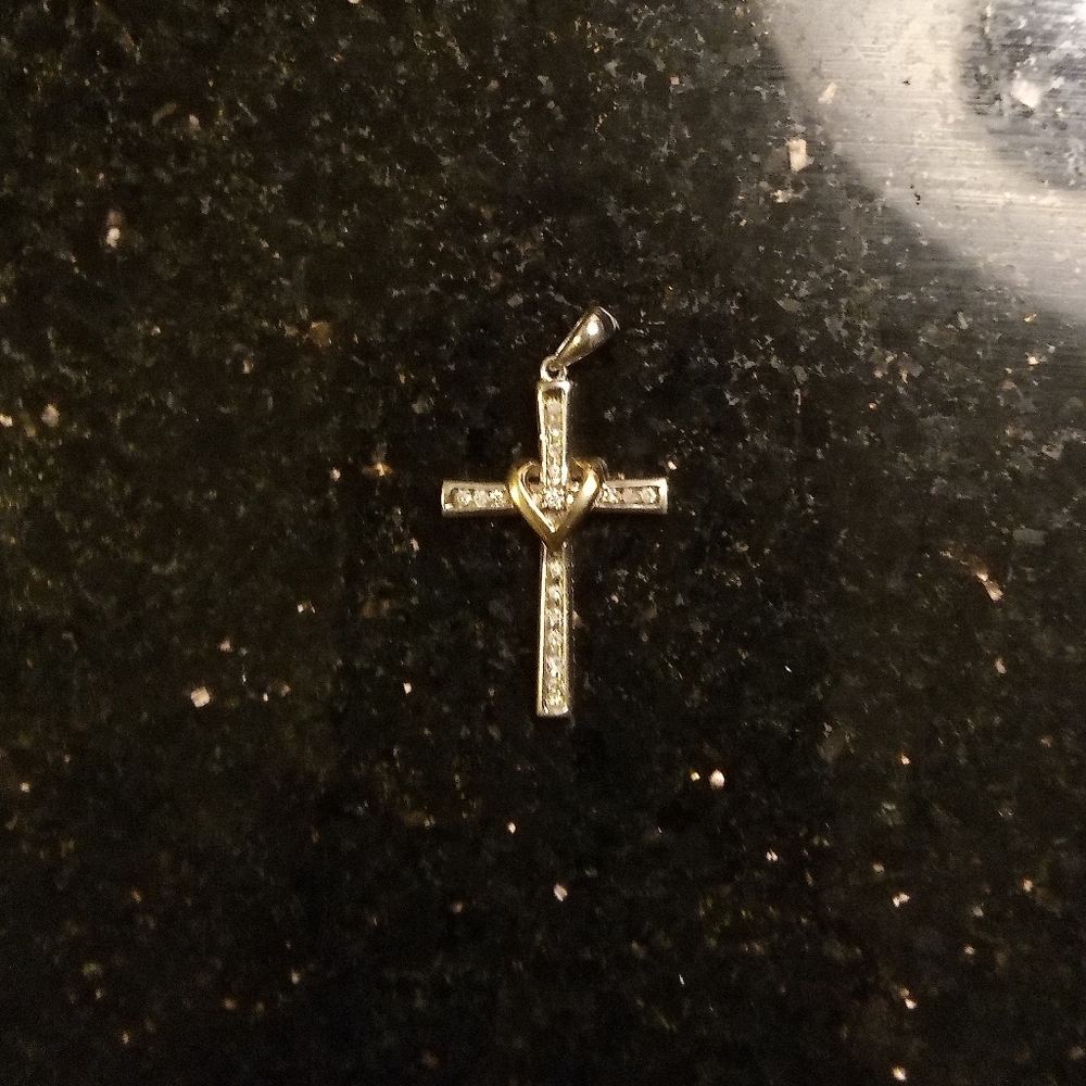 14K gold sterling silver cross with one quarter diamond pendant